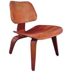 Seltene Charles Eames LCW in roter Analine-Farbe für Evans