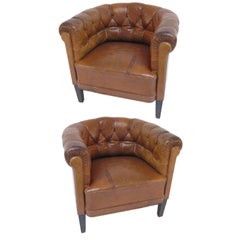 Pair of English Leather Barrel Chairs