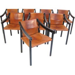 set of 10 mid-century leather 
ebonized dining chairs