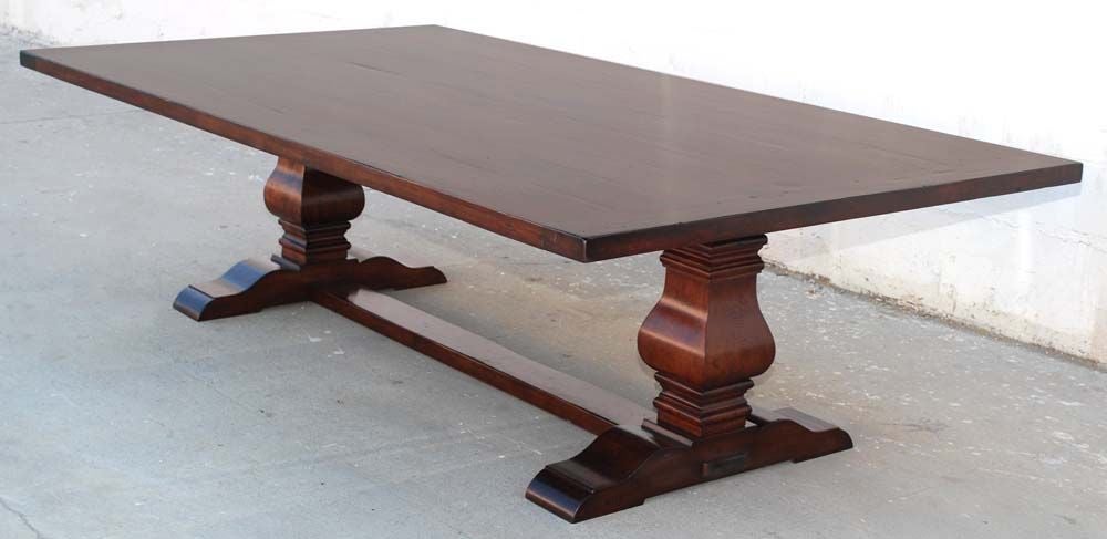 This large dining or banquet table made from solid, distressed cherrywood is seen here in 104
