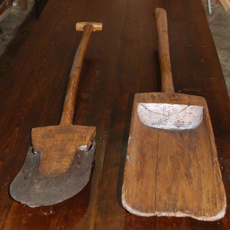 Spade and shovel from Swedish countryside. The spade is older, perhaps 17th C. with wrought iron sleeve. Shovel is 19th C.<br />
<br />
Spade is 43.5