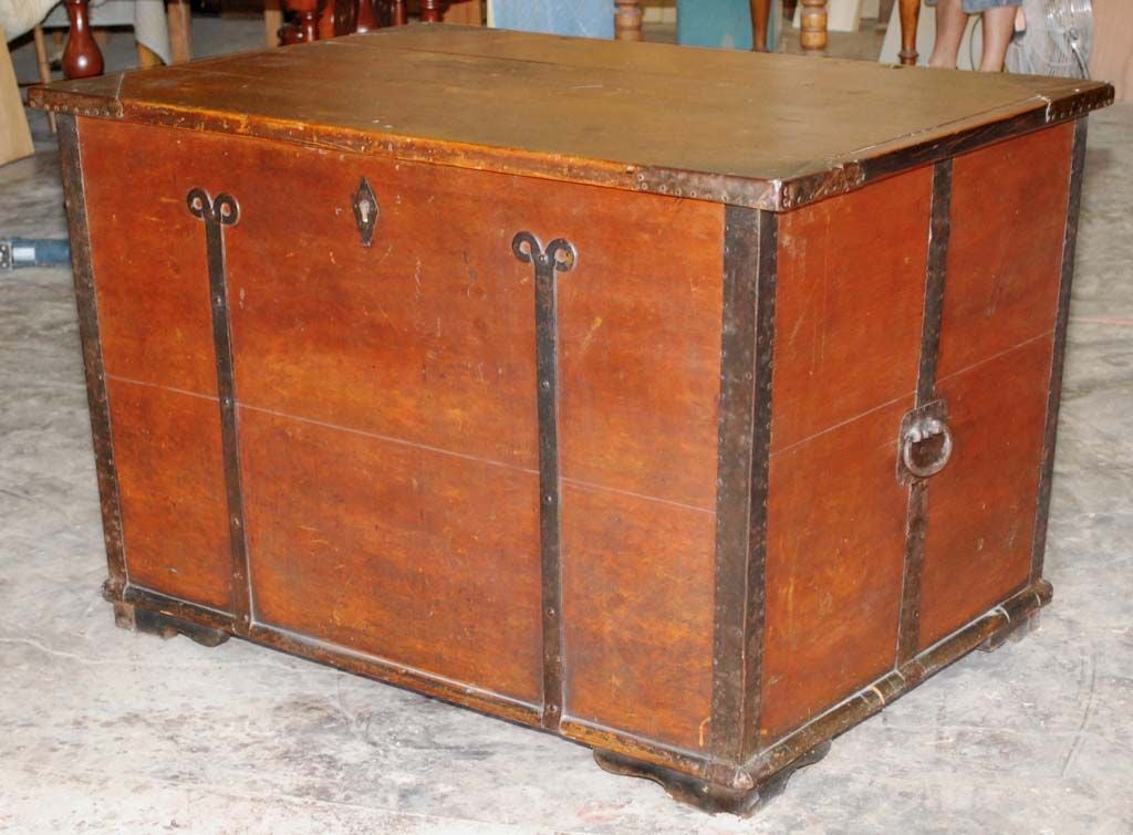 Large dowry chest with great hardware. Original paint was feather brushed for a wood grain texture. Has interior candle box.