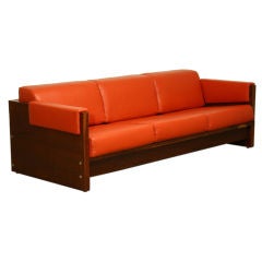 Brazilian exotic wood and red leather sofa with chrome detailing