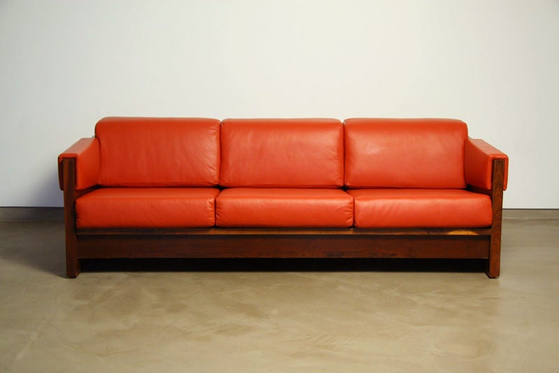 Brazilian exotic wood and red leather sofa with chrome detailing