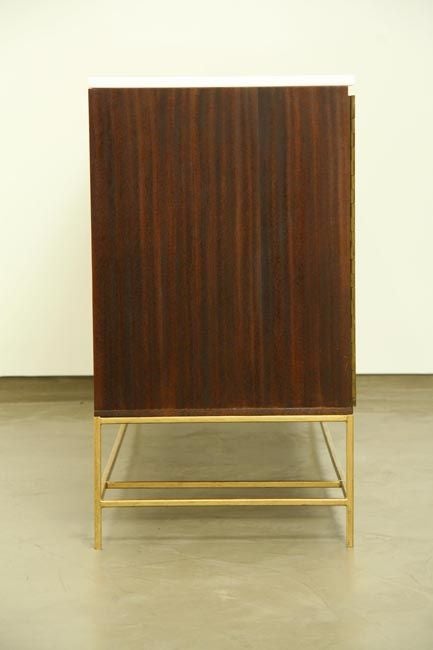 Brass A mahogany and brass credenza by Paul McCobb for Calvin