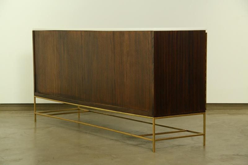 A mahogany and brass credenza by Paul McCobb for Calvin 1