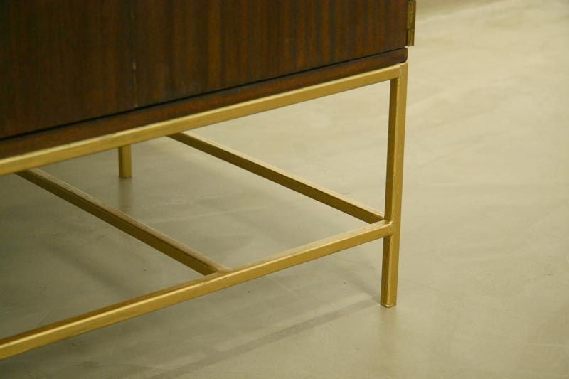 A mahogany and brass credenza by Paul McCobb for Calvin 2