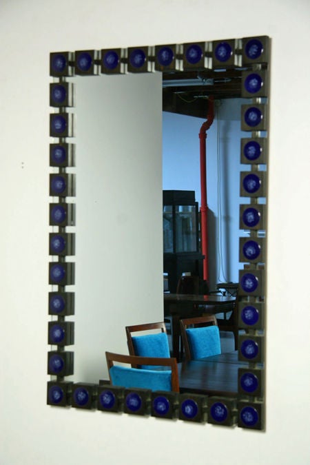 Mirror with ebonized wood squares and blue enamel circles
