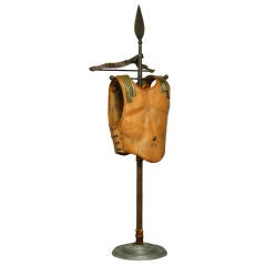 Decorative valet with leather breastplate and bronze elements