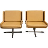 Pair of,  swivel folding, lounge chairs by Stendig.