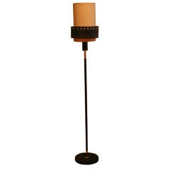 Floor lamp by Jacques Adnet.