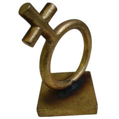 A Sculpture / Bookend in the form of a Female Symbol by C.Jere