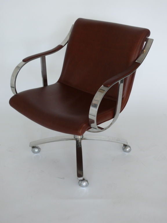 Floating chrome office chair by Gardener Leaver for Steelcase upholstered in carmel leather.  Multiple available.