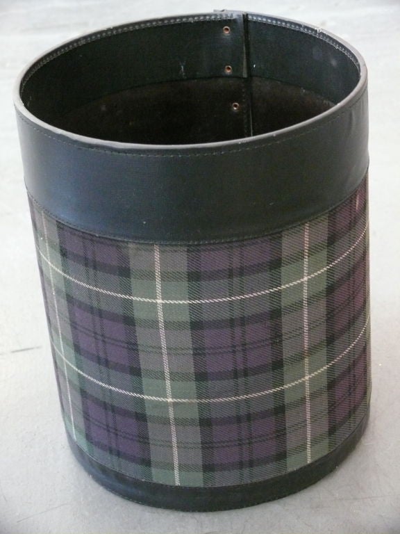 Plaid and leather trash can by Jacques Adnet.