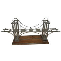 ERECTOR SUSPENSION BRIDGE SCULPTURE