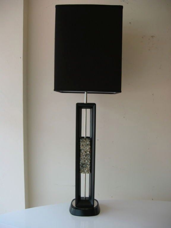 This ebonized beautiful tall wood and quartz stone Danish vintage mid century modern tall lamp has a center grouping of beautiful quartz stones; blueish on one side and pinkish on the other side. Newly rewired with nickel silver appointments. Sold