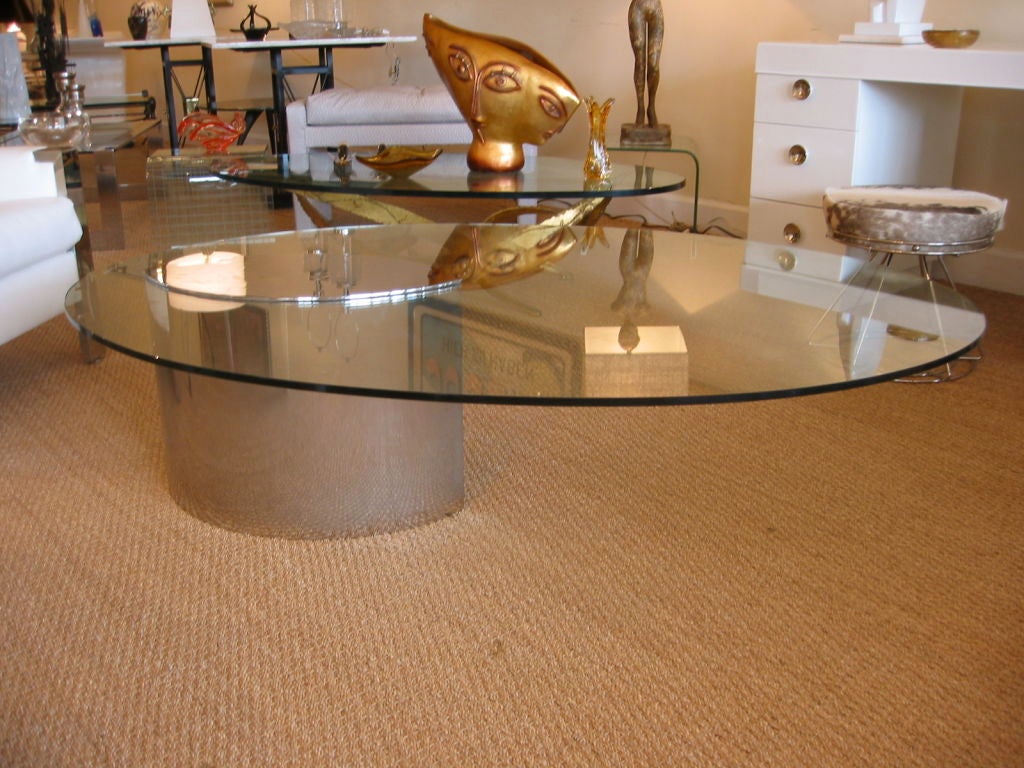 Lunario cantilevered table with tempered hand blown Murano glass top. Three dimples on glass indicating hand blown. Very heavy oval chrome base containing counter balance weights. Original Lunario stamped label on glass top. This is a rare original
