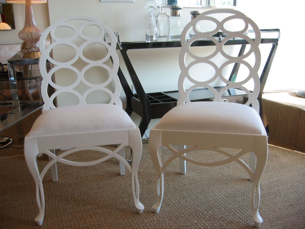 This set of four Frances Elkins Loop Chairs are directly from the personal estate and collection of the distinguished Jerry Goldfarb of New York City. He was the owner of an interior design firm and a super chic Manhattan furnishings store.  They