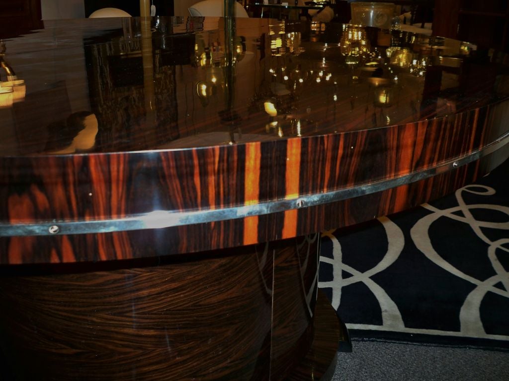 Mid-20th Century A Large Round Extending Art Deco Dining Table by J. DeCoene For Sale