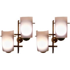A Pair of Brass and Lacquered Metal Wall Sconces by Stilnovo