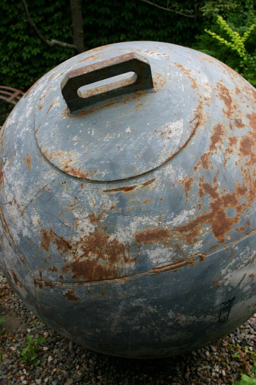 Extremely Graphic and Immense Iron Sculptural Object.  Originally used as a Harbor Bouy or Float. Original Paint with Signs of Rust.