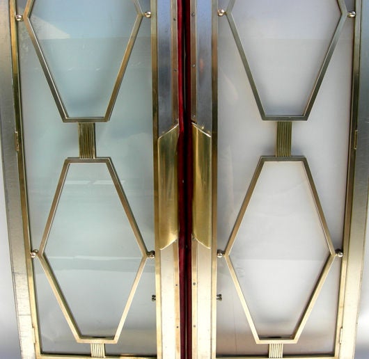 From the Canadian Pacific Lines' SS Empress of Britain come these great doors. The pair have the same detail on both sides, and display beautifully. The hardware is standard for commercial door frames, and can easily be installed by any experienced