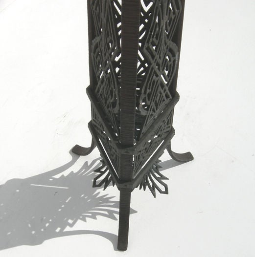 These stylish stands will look great in any interior or exterior setting. The leg sections are hand wrought iron, while the center panels are a cast iron. The tops are bakelite, and support most generous size plants, as shown. The condition is
