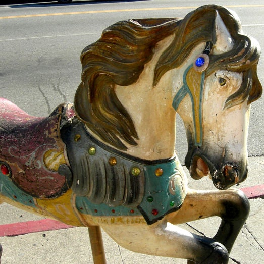 Ah, the painted ponies....These wonderful creatures evoke such emotion and childhood memories of the carnival or local carousel. Unfortunately, most seen today are later issues of metal or fiberglass bodies. Earlier wooden examples have usually been