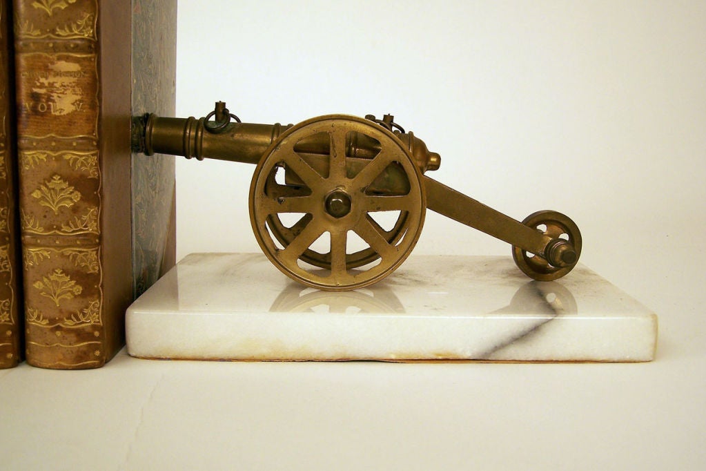 brass book end cannons