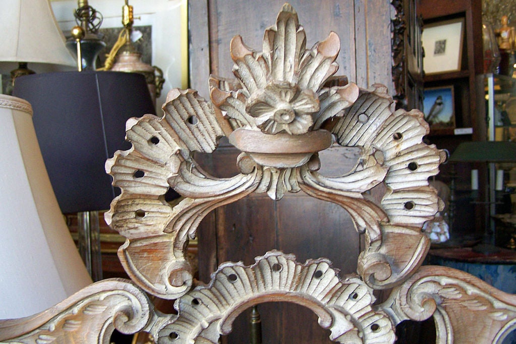 Elaborately Carved Rococo Style Framed Mirror with Pickeled Pine Finish.  Italian, Circa 1950.
