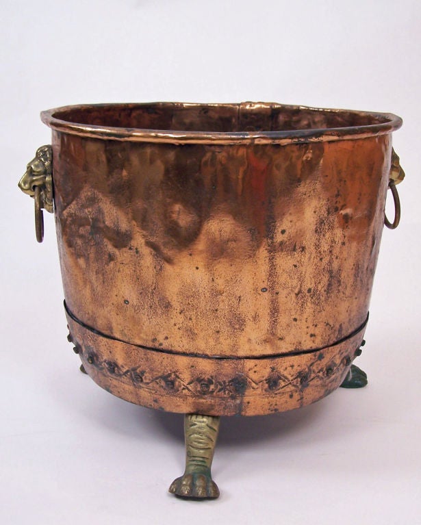 Nice size copper and brass footed pot with great old patina.