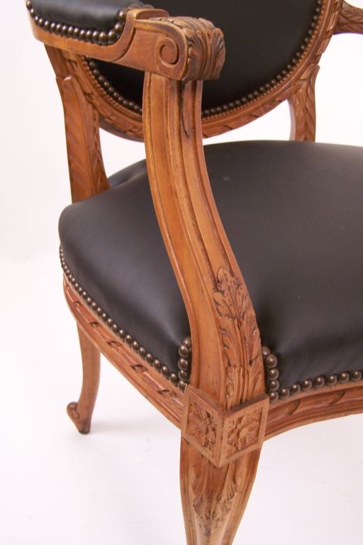 Carved French Louis XV Style Armchair with Black Leather Upholstery For Sale