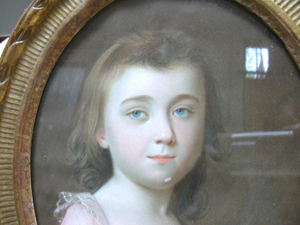 A charming pastel portrait of a young girl a period coustume signed and dated P Schmid 1784