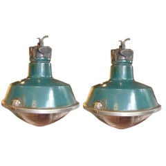 Vintage Pair of enameled industrial hanging lights