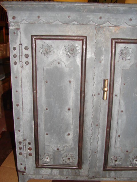 Unusual scalloped zinc cabinet