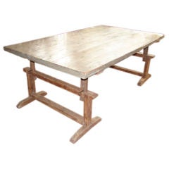 Large dining table with adjustable base
