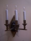 Pair of gilt wood lionhead motif sconces
