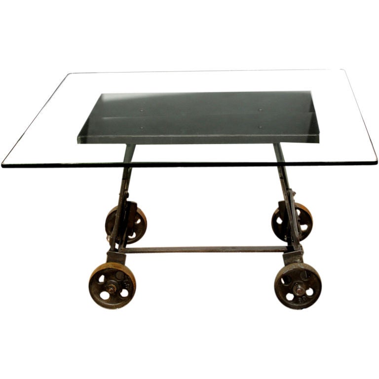 Rolling industrial dining table at 1stDibs