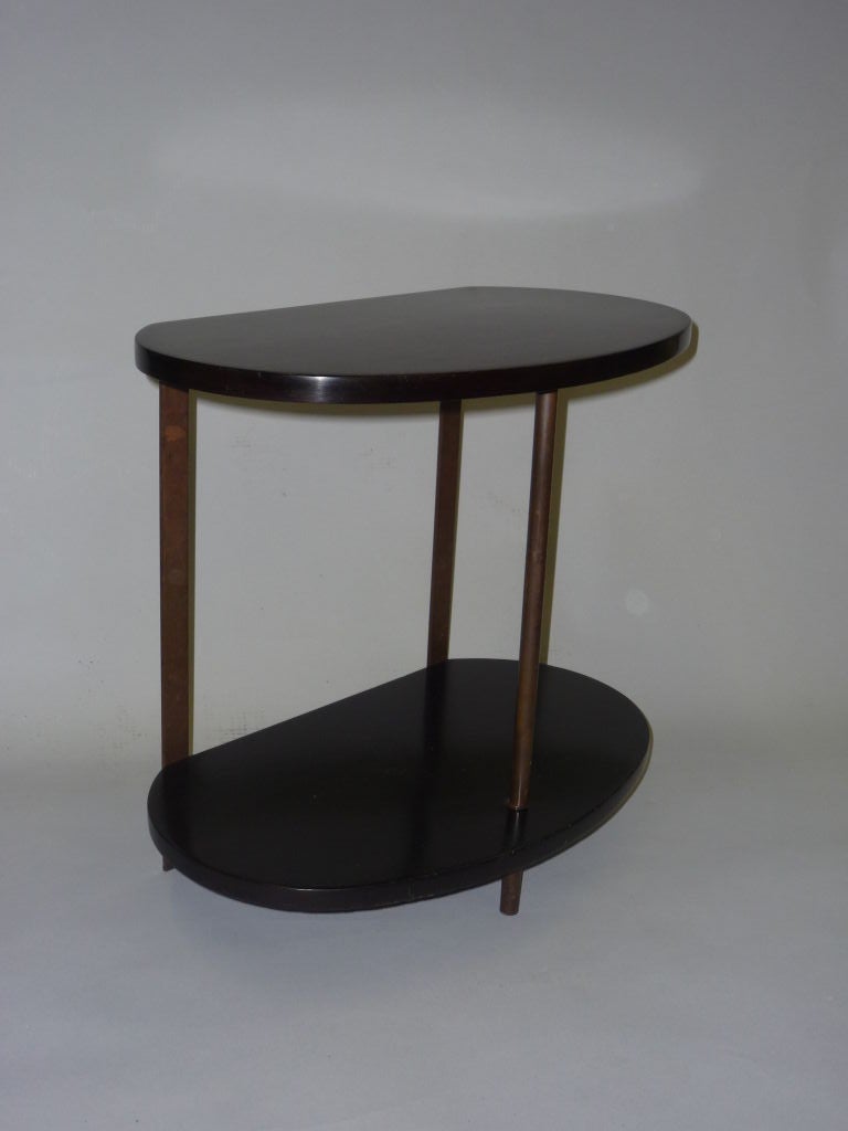 AN OVAL SHAPE ETTAGERE