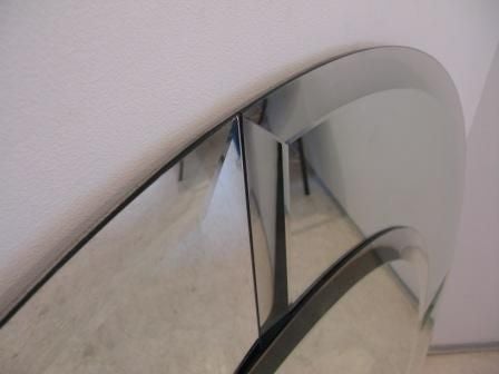 One Large Saturn Mirror by Karl Springer