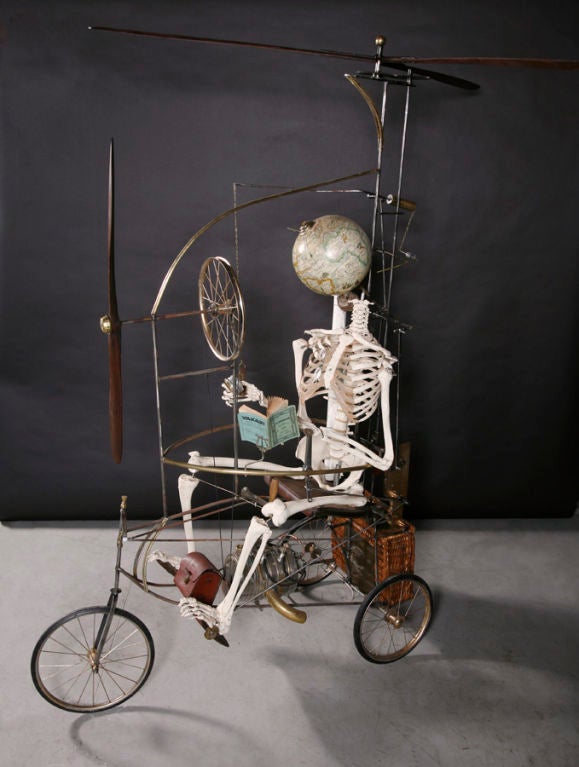 This stunning mixed media mechanical sculpture is an original piece imported from Belgium. Each delicate structural component works together to create fluid motion in this impressive artistic mechanism. A provocative addition to any space, this