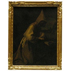 Vanitas painting: priest with skull and book