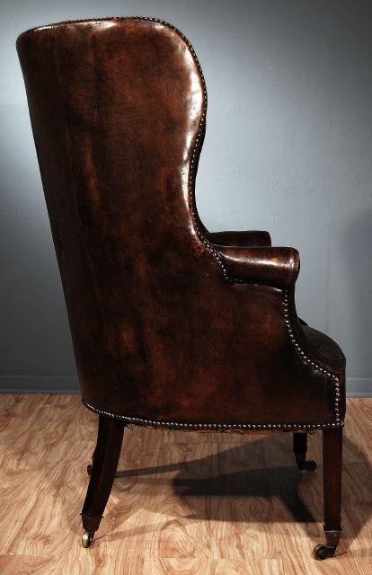 An English Leather and Mahogany Tub Chair, on Casters.  George III Period, Circa 1780