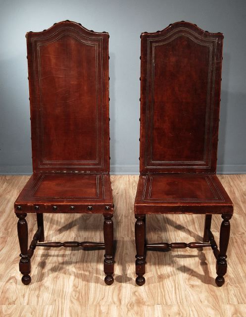 Two of Five pair of Potugese Hall Chairs.
