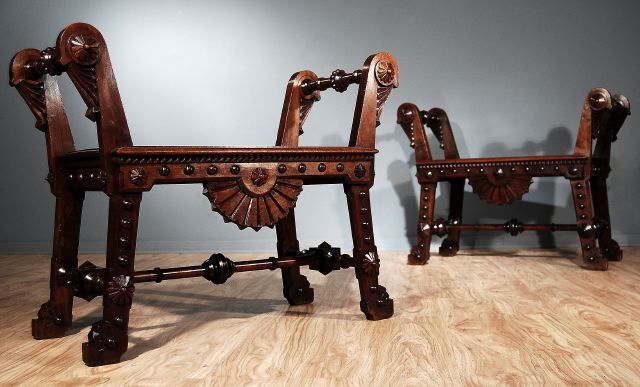 A pair of Spanish Carved Walnut Stools