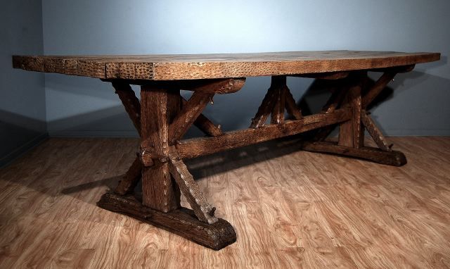An Oak Trestle Type Dining Table, Surface Texture To Simulate A 
