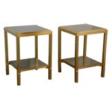 Pair of gilt mirrored two tier side tables