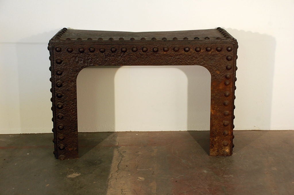 Massive riveted French industrial console