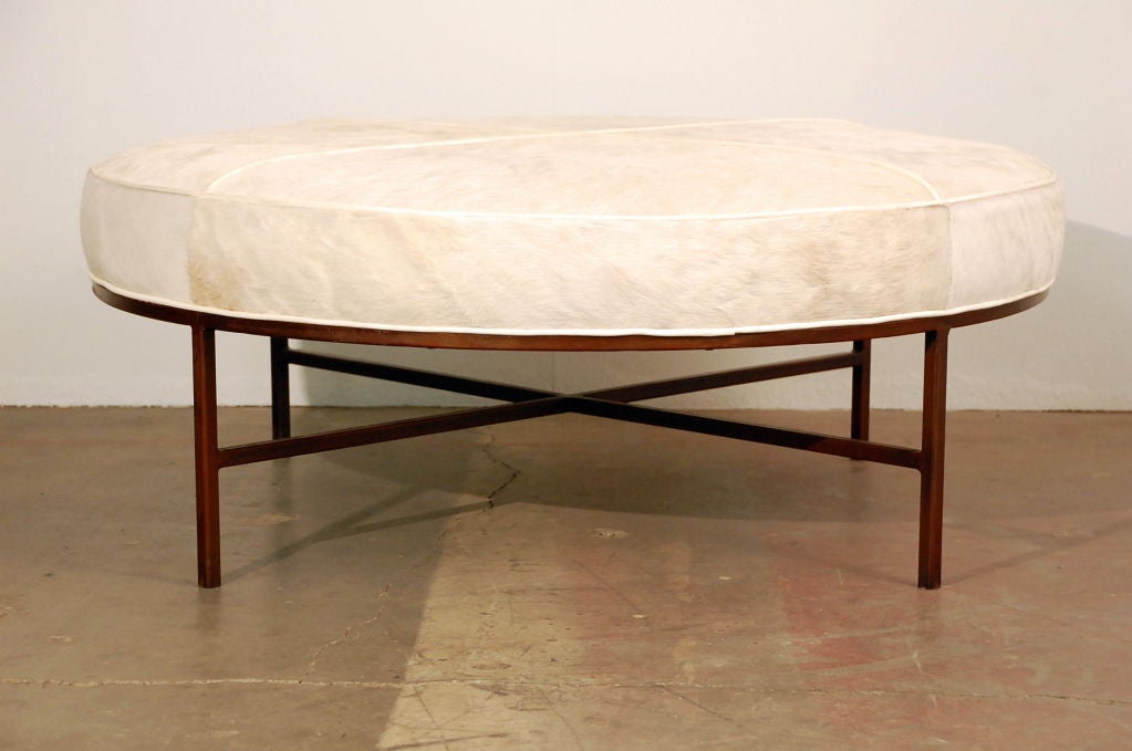 White pony hide and leather ottoman
