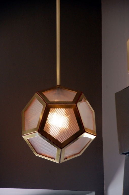 The geometric brass, tan leather and glass 'Pentagone' lantern by Design Frères. In the style of Adolf Loos. The Dodekaeder lamp as originally designed by Adolf Loos for the Knize Gentlemen's stores (Vienna, Paris, Berlin, Bad Gastein), This is our